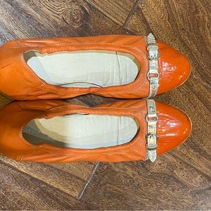 Orange leather flats
